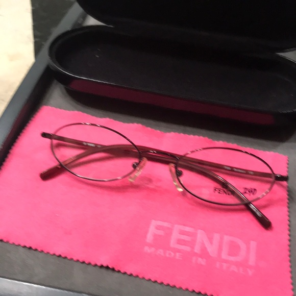Fendi F559 Bordeaux oval glasses. Never owned. Fendi case. Made in Italy
